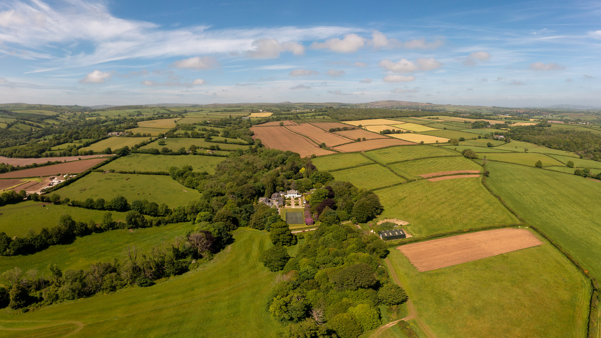 Panoramic aerial of Treworgey Manor Holiday Cottages near Liskeard in Cornwall