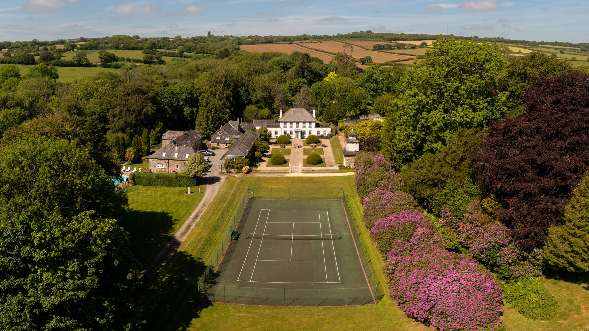 Outdoor Tennis Court at Treworgey Manor Holiday Cottages in Cornwall